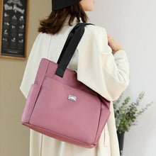 Laden Sie das Bild in den Galerie-Viewer, 👜👜Vielseitige einfache einfarbige Nylonhandtasche mit großer Kapazität